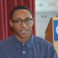 An alumnus talking to a student at the 30 Minute Mentors Event